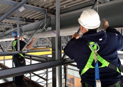 Installation de plomberie en hauteur avec échaffaudage à Joliette - Plomberie le Plomb