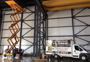 Installation de plomberie en hauteur avec nacelle à Joliette - Plomberie le Plomb